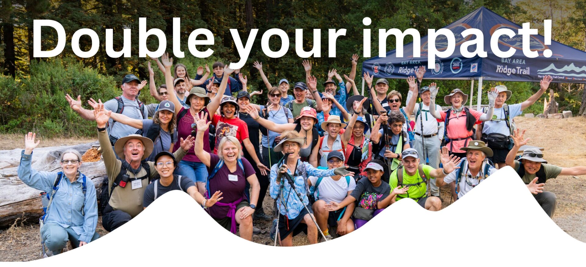 Group of hikers smiling and waving, overlay text says Double Your Impact!